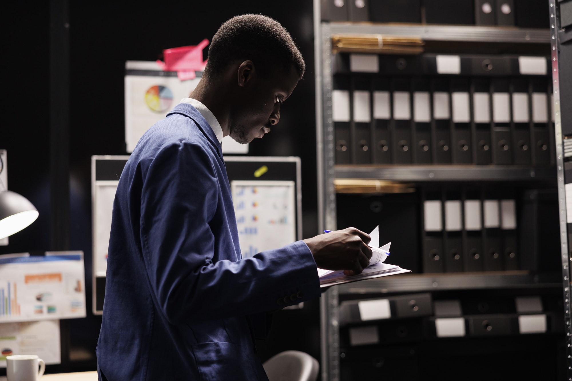 Bookkeeper reading bureaucracy record